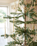 Árvore de Natal Slim Alpine com Galhos Articulados, Suporte Metálico e Micro LEDs Embutidos